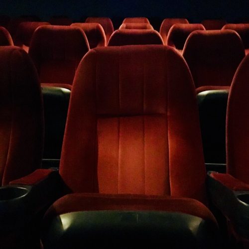 rows-of-red-seats-at-movie-theatre--e1622185542104.jpg