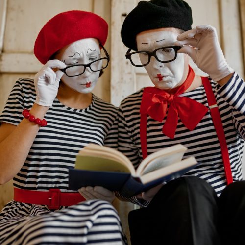 two-clowns-in-glasses-mime-artists-parody-comedy.jpg